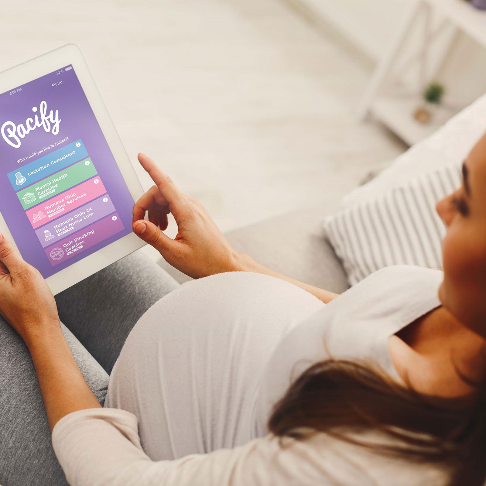 Pregnant member uses the Pacify app on her tablet